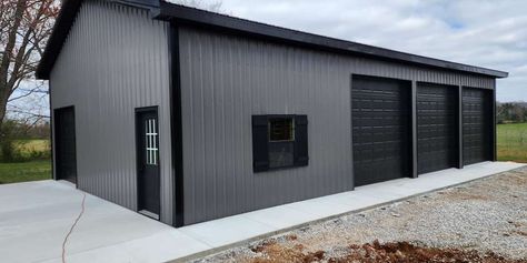 Charcoal And Black Metal Building, Black Pole Barns, Black Metal Building, Shop Building Ideas, Steel Garage Buildings, Diy Pole Barn, Pole Barn Ideas, Land Ideas, Pole Barn Garage