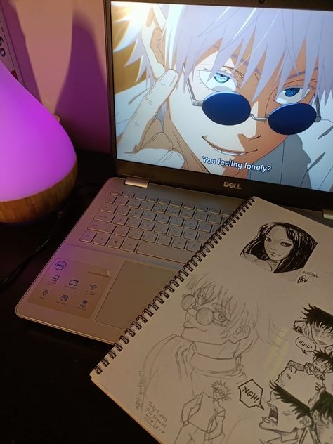 Gojo saying are you lonely? On the laptop screen and gojo drawing on the book next to the laptop Jjk Birthday, Guy Bedroom Aesthetic, Watching Anime Aesthetic, Gojo Birthday, Jujutsu Kaisen Aesthetic, Anime Computer, Anime Vibe, My Birthday Month, Japanese Animated Movies