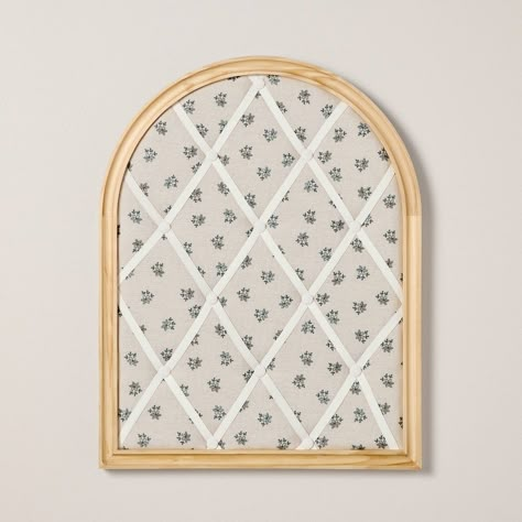 Create an amazing display of your family photos and other memories with the Arched Photo and Memory Collage Board with Patterned Fabric from Hearth & Hand™ with Magnolia. This arched board features floral-print fabric with tufted accents to elevate the look. The wooden frame creates an appealing look, while the elastics make it convenient to display. Place it on the tabletop or hang over the wall for a beautiful look. Hearth & Hand™ with Magnolia: Gather • Create • Enjoy Fabric Photo Board, Wall Art Above Desk, Apartment Wall Decor Bedroom, Family Keepsake Crafts, Grand Millennial Style Decor, College Room Decor Ideas Wall Art, Photo Wall Ideas Bedroom Aesthetic, Aesthetic Cozy Room Decor, Vintage Nursery Wall Decor