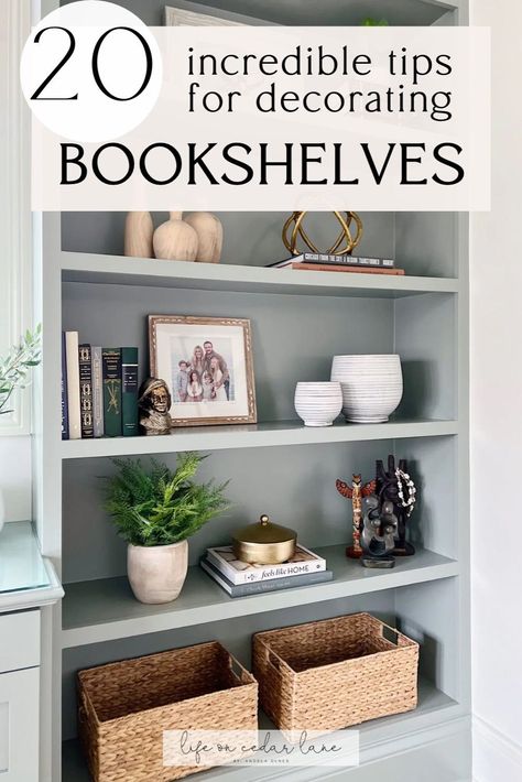 Elevate your interior design with our guide to Styling a Bookcase. Explore Creative Bookshelf Styling Ideas that make a statement. Learn How To Style Open Bookshelves to create a balanced and stylish arrangement. Whether you’re an avid reader or a decor enthusiast, these Creative Bookshelves ideas are perfect for you. Living Room Shelf Design Ideas, Bookshelf Styling With Books And Plants, Decorate Office Bookshelf, Bookshelves With Picture Frames, How To Decorate The Top Of A Bookshelf, Built In Styling Bookshelves, How To Arrange Decor On Shelves, Decor Shelf Ideas Living Room, How To Decorate A Bookcase Living Room