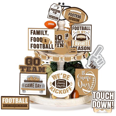 PRICES MAY VARY. Package Includes: you will receive18 pieces of football tiered tray decors in different style, such as football shape, helmet shape and various related texts, suitable for decorating your tiered tray or table on football season or sharing with friends who love playing football Quality Material: the football party decors are made of quality wood with clear print, sturdy and reliable, solid and reusable, not easy to fade, break or deform, can be kept for a long time Novelty Design Game Day Sign, Football Tiered Tray, Wooden Football, Table Home Decor, Football Decorations, Football Season, Tiered Tray Decor, Tiered Tray, Tray Decor