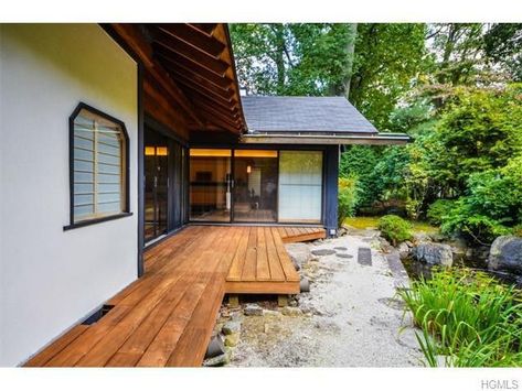 A Serene Japanese-Style Retreat in Suburban New York | realtor.com® Japanese Porch, Japanese Deck, Portico Entry, Japanese Exterior, Japan House Design, Japanese Inspired Home, Japanese House Design, Japanese Garden Landscape, Modern Front Yard