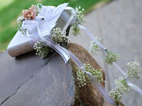 Brides bible with small peach bouquet and beaded ribbon.  Bundles of babys breath cascade down like little clouds.  www.flowerandstem.com Skouer Ruikers, Bible Bouquet, Book Bouquet, Branch Centerpieces Wedding, Wedding Cake Greenery, Bbq Wedding Reception, Wedding Reception Accessories, Unique Bridal Bouquets, Prayer Books