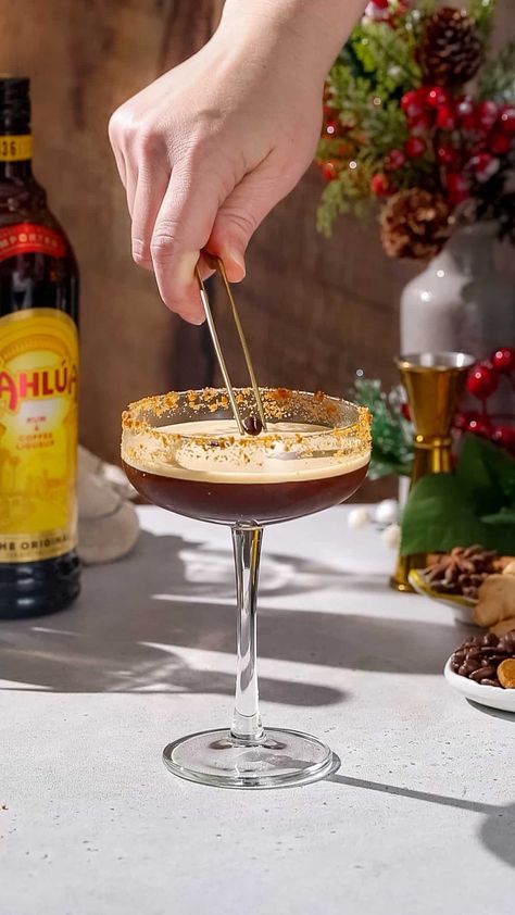 The Gingerbread Espresso Martini is a festive twist on the classic Espresso Martini recipe! Gingerbread syrup gives this drink a fun holiday twist, with notes of ginger and molasses. Don't forget the gingerbread cookie crumbs on the rim for a garnish! This tasty cocktail is perfect for Christmas cocktails or for any holiday party. Gingerbread Espresso Martini, Gingerbread Martini, Chocolate Vodka, Festive Holiday Cocktails, Gingerbread Syrup, Espresso Martini Recipe, Kahlua Coffee Liqueur, How To Make Gingerbread, Nitro Cold Brew