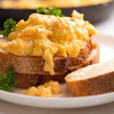 Soft, custardy scrambled eggs piled onto toast Scrambled Eggs Without Milk, Gordon Ramsay Scrambled Eggs, Easy Scrambled Eggs, Weekend Lunches, Best Scrambled Eggs, Eggs Quiche, Recipe Tin Eats, Scrambled Eggs With Cheese, Fluffy Scrambled Eggs