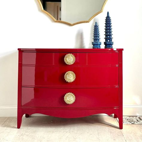 If you're looking for a bold and stylish addition to your home, we have the perfect fit: Our Curved Accent Chest in Lipstick Red is an absolute eye-catcher, and it's ready to ship immediately! Tap the image to shop. #accentchest #floralhardware #hardwaredesign #lacquerfurniture #lacqueredfurniture #lacquerlovers #interiorstyling #interiordesigntrends #furnitureflip #vintagefurniture #handmadefurniture #handmade Colourful Furniture, Red Painted Furniture, Lacquered Furniture, Painting Fabric Furniture, Refinished Vintage Furniture, Asian Interior Design, High Gloss Furniture, Lacquer Furniture, Accent Chest