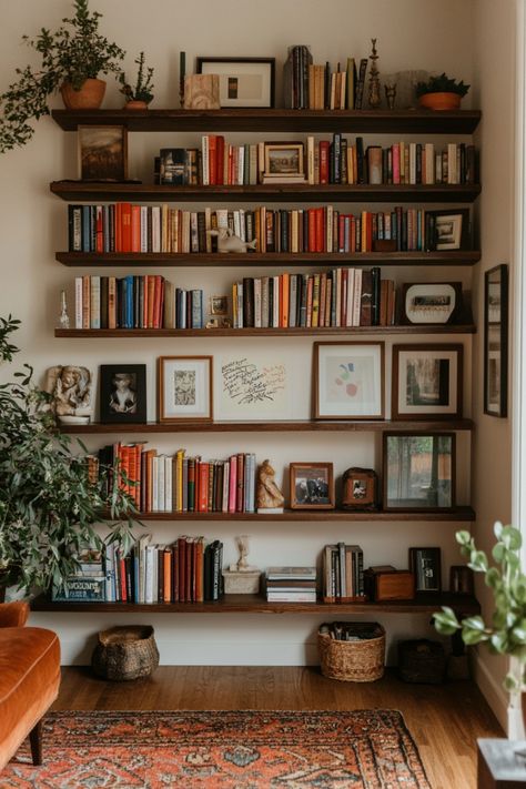 Turn a spare room in your home into a cozy home library with these tips and design ideas. Apartment With Bookshelves, Bookshelf In Office Ideas, Home With Bookshelves, Bookshelves Next To Window, Boho Living Room With Bookshelves, Bookshelf Over Desk, Study Shelving Ideas, Bookcase Arrangement Ideas, Ideas For Book Shelves