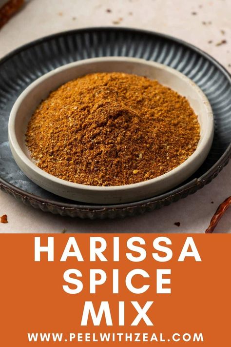 Spice up your dishes with this easy homemade harissa spice blend! A smoky, fiery mix of cumin, paprika, and chili flakes – perfect for grilling, roasting, or sprinkling on veggies. A great spice blend for chicken or ribs! Harissa Powder Recipes, Harissa Spice Blend Recipe, Harissa Powder, Homemade Harissa, Healthy Condiments, Diy Spice Mix, Easy Sauce Recipe, Harissa Recipes, Spice Blends Recipes