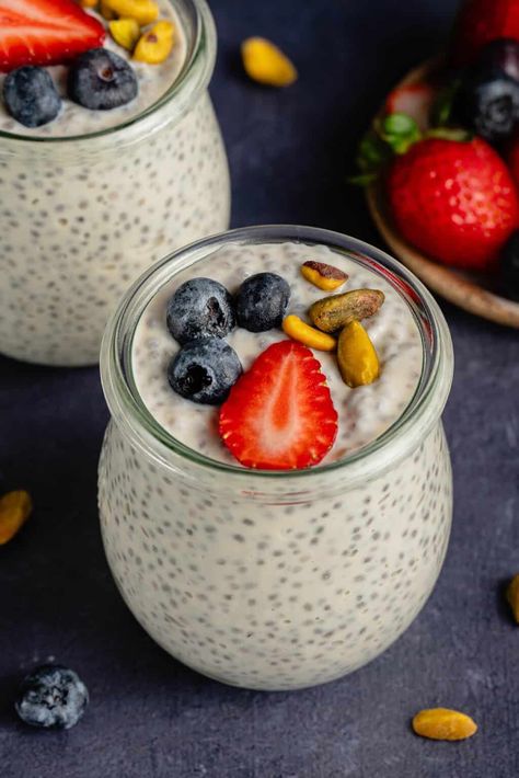 This Vegan Chia Pudding is made rich and creamy with the perfect ratio of chia seeds and vegan Greek-style yogurt. It's filled with healthy fats, plant-based protein, and dietary fiber. Great option for meal prep or healthy breakfasts on the go. #chiapudding #veganprotein #veganyogurt #veganbreakfast #sweetsimplevegan Chia Pudding With Yogurt, Vegan Chia Seed Pudding, Vegan Chia Pudding, Breakfasts On The Go, Vegan Greek, Healthy Breakfast On The Go, Fruit Pudding, Mix Fruit, Chia Seed Recipes Pudding