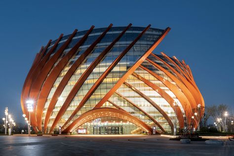 Just imagine watching Finding Nemo or The Little Mermaid there! Designed to proudly sit on the coast of the port city of Qingdao, the Show Theater's conch shape is a hat-tip to the city's marine-rich culture. It also sits right beside the Grand Theater, which has a more subtle design language, creating a kind of Shell Inspired Architecture, Shell Architecture Concept, Shell Structure Architecture, Shell Architecture, Thesis Proposal, Business Incubator, Architecture Lifestyle, Shell Structure, Parametric Architecture