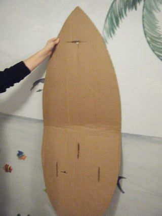 Carlos, the Corrugated Cardboard Surfboard: : 6 Steps - Instructables Diy Surfboard Decor, Cardboard Surfboard, Cardboard Costume, Surfboard Decor, Surfboard Shapes, Luau Theme Party, Hawaiian Birthday Party, Hawaiian Birthday, Birthday Party Decorations Diy