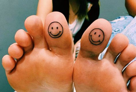 cute, small, smiley toe tattoo Toe Tattoo, Emoji Tattoo, Smiley Face Tattoo, Infinity Tattoo With Feather, Toe Tattoos, Balloon Tattoo, Matching Best Friend Tattoos, Best Friend Tattoos, Face Tattoo