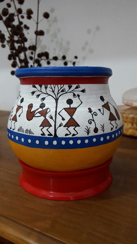 Acrylic on clay pot #Warli painting Warli Painting On Matka, Drawing On Pots Ideas, Varli Painting On Pot, Kalamkari Pot Painting, Pot Warli Painting Ideas, Warli Art Pot Painting, Pot Painting Ideas For Competition, Warli Pot Painting, Varli Painting Art On Pot