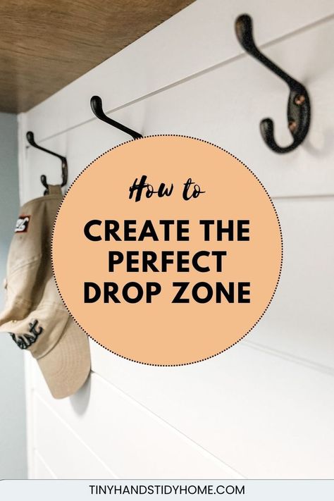 Wall hooks on a white shiplap wall. The text over the image reads, "how to create the perfect drop zone". Drop Space Ideas, Diy Drop Zone Small Spaces, Entryway Coat Hanger Ideas, Jacket Hooks Entryway, House Drop Zone, Drop Off Zone Entryway, Small Corner Entryway Ideas, Home Drop Zone, Small Drop Zone Ideas