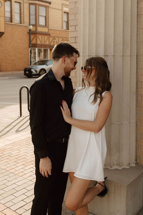 couple smiles at each other during dreamy engagement photos Couples Downtown, Downtown Photoshoot, Downtown Engagement Photos, Engagement Photos Downtown, Save The Date Pictures, Classy Engagement Photos, Colorado Engagement Photos, Couples Pics, Cute Engagement Photos