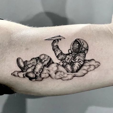 Astronaut Tattoo Ideas Spaced Out Tattoo Sleeve, Astronaut Arm Tattoo, Funny Astronaut Tattoo, As Above So Below Tattoo Astronaut, Galaxy Chest Tattoo Men, Realistic Astronaut Tattoo, Astronaut Sitting On Planet Tattoo, Spaceman Tattoo Design, Space Arm Tattoos For Women