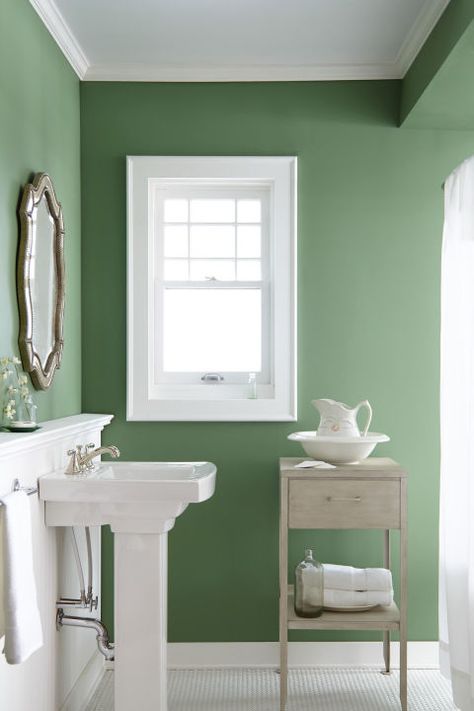 When in doubt, go with a fresh shade of green. "At the moment, I'm really drawn to fresh botanical shades, like 'Magnolia Green,'" Joanna said. "I've always been drawn to nature in my design work and really love bringing a touch of it inside. I think it would be fun choice for kitchen cabinets, or anywhere that needs a touch of nature." The hue is also perfect for brightening up a bathroom, entryway, guest room, or any other small space. Green Paint Bathroom, Joanna Gaines Favorite Paint Colors, Green Bathroom Paint, Joanna Gaines Bathroom, Fixer Upper Paint Colors, Joanna Gaines Paint, Paint Bathroom, Bathroom Paint, Palette Design