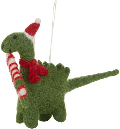 Harrods Felted Diplodocus Christmas Ornament. #ad. This diplodocus dinosaur is wrapped up warm in a knitted scarf. Holding a striped stocking and a miniature Santa hat sits atop his head as the final touch. Dinosaur Ornament, Fortnum And Mason, Holiday Stocking, Lighted Ornaments, Christmas Characters, Holiday Stockings, Festive Decor, Felt Ornaments, Holiday Lights