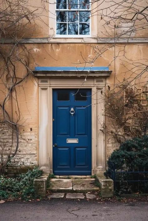 Dark Blue Front Door, Tan Houses, Mediterranean Front Door, Yellow Brick Houses, Teal Front Doors, Teal Door, Orange Front Doors, Best Front Door Colors, Tan House