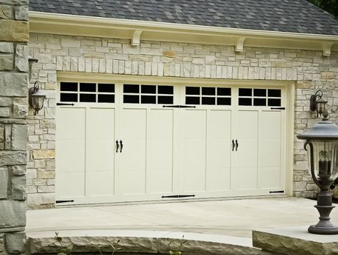 A beautiful Haas door with black windows and hardware. The cream colored door has a timeless appeal. Haas Garage Doors, Fiberglass Garage Doors, Garage Door Decorative Hardware, Carriage Garage, Black Garage Doors, Side Hinged Garage Doors, Garage Door House, Carriage House Doors, Carriage Garage Doors