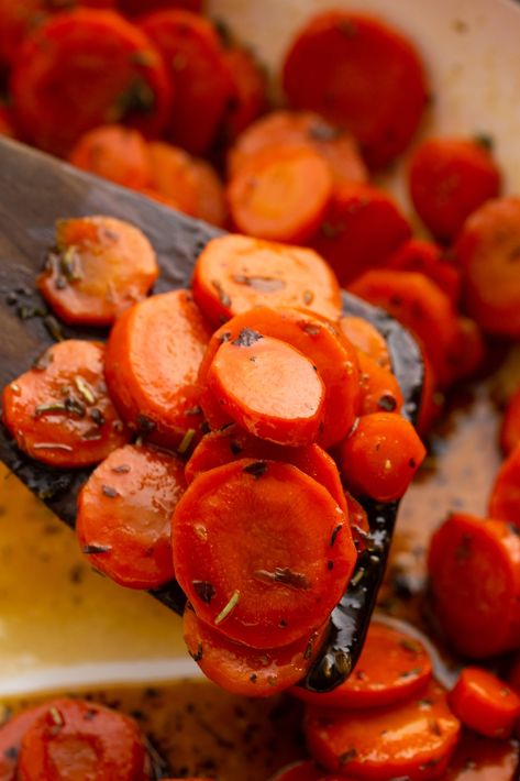 Maple Cider Glazed Carrots are sweet and fragrant medallions boiled in a cider bath and glazed with maple syrup reduction. The result is a perfect side dish that can be quickly cooked on the stovetop for any holiday or weeknight dinner, making use of garden-fresh carrots. Maple Glazed Carrots, Fresh Carrots, Side Dishes For Chicken, Vegetable Casserole, Side Dish Recipes Easy, Glazed Carrots, Vegetable Side, Delicious Vegetables, Carrot Recipes