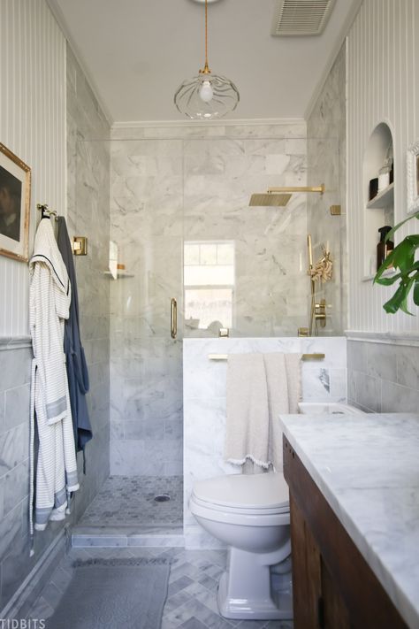 European Farmhouse Master Bathroom Reveal - Marble tile, gold and antique finds bring this small bathroom together. #marblebathroom #bathroomreveal #bathroommakeover #marbletile #europeanfarmhouse #masterbathroom #camitidbits Small Main Floor Bathroom, European Bathroom Vanity, Small Bathroom Walk In Shower Ideas Tile, Small Home Style, European Style Bathroom Design, Galley Master Bath, Three Quarter Bathroom Ideas, Small Primary Bathroom Ideas, Three Quarter Bathroom