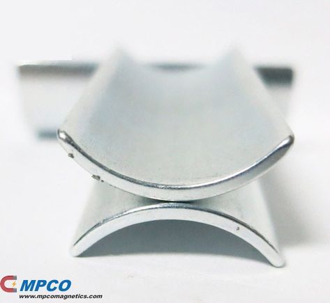 N52 Strong Neodymium Rare Earth Arc Permanent Bearing System Magnet Parameter Part No. NSGN50-80 Dimensions Customized sizes Material Sintered Neodymium-Iron-Boron (NdFeB) Shape Arc / Segment Plating Blue Zinc (Zn) Magnetization Direction Diameter Grade N52 Maximum Temperature: 80 Degree Magnetization: Inside Curve to Outside Curve Dimensional Tolerance +/-0.005″  we combine this knowledge and experience with a broad range of magnetic bearing and hardware configurations Blue Plates, Magnets, Energy, Quick Saves