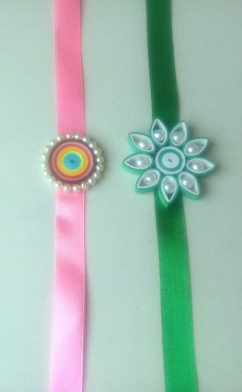 Quilled rakhi... paper craft Quelling Rakhi, Quilling Ideas For Kids, Easy Paper Quilling Ideas, Rakhi Designs Handmade, Easy Paper Quilling, Paper Quilling Ideas, Quilling Rakhi, Quilling Images, Handmade Rakhi Designs