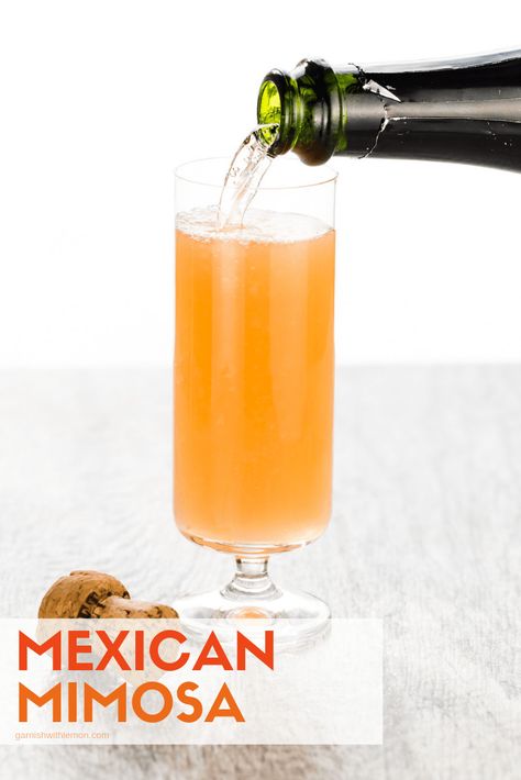 If you aren't hosting Sunday brunch soon, you'll find a reason to after you try this Mexican Mimosa. Tequila is the secret ingredient that sets this mimosa apart from the rest. #mimosas #tequila #bubbles #brunch Mexican Brunch Drinks, Mexican Mimosa, Breakfast Mimosa, Host Brunch, Mimosa Recipes, Bday Brunch, Mexican Brunch, Batch Cocktail Recipe, Mimosa Cocktail