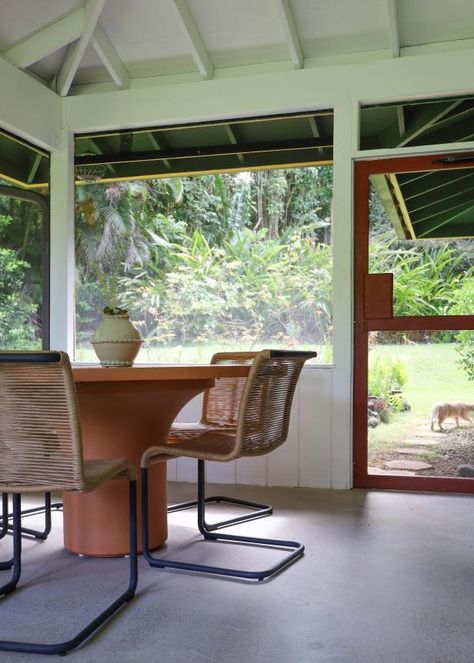 Surrounded by native foliage visible from the three lanai spaces, the home couldn't feel any more perfect for the Aloha state. Unlike a traditional porch or patio, the Hawaiian word "lanai" describes an outdoor space that is an extension of the home, often covered under the home's roof and included in the home's floor plan. Hawaiian Bungalow Interior, Hawaii Farmhouse, Renovation Aloha, Hawaiian Exterior Design, Hawaii Homes Interior, Traditional Hawaiian House, Hawaii House Hawaiian Homes, Traditional Porch, Washable Wallpaper