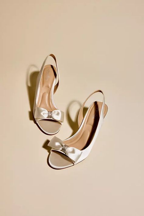 Satin and Rhinestone Bow DOrsay Kitten Heels | David's Bridal Rhinestone Bow, Book An Appointment, Davids Bridal, Designer Heels, Kitten Heels, Buy Online, Satin, Heels, How To Wear