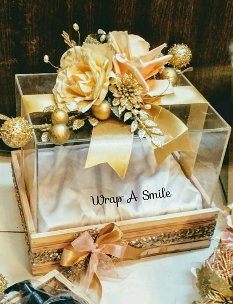 Our Pretty bridal acrylic Trousseau box! Super classy for gifting! Wood hampers with decor for cosmetics & accessories! 💝 In complete awwe of these! #trousseaupacking #acrylicbox #trays#weddingtrousseau #woodentrays #woodenplatters #floraldecor #acrylicboxes #floralboxes #trousseaupackingservices #luxurygifting ##bespokepackaging Acrylic Box Gift Hampers, Acrylic Gift Box Ideas, Wedding Basket Gift Ideas, Acrylic Box Packaging, Acrylic Box Gift, Wood Hamper, Wedding Hampers, Diy Projects For Adults, Wedding Gift Hampers