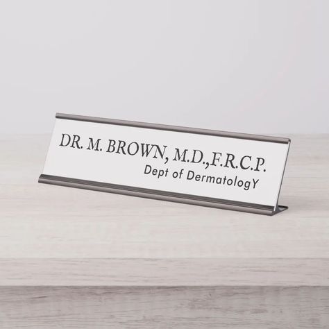 🏥 Elevate your workspace with a touch of professionalism and personalization! Our Doctor Desk Name Plate is the perfect addition to any medical office, providing a polished and distinguished look. Crafted with precision, this name plate not only showcases your title but also adds an element of sophistication to your desk. Order yours today and make a statement in your practice! #doctorsofinstagram #medicaloffice #deskdecor #professionalstyle #doctorlife #officeinspiration #workspacegoals #med... Doctor Desk, Desk Name Plate, Desk Name, Desk Name Plates, Medical Office, Professional Fashion, Office Inspiration, Dermatology, Medical Professionals