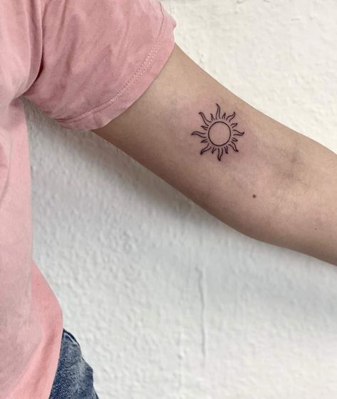 Amazing Sun Tattoo Design Ideas and Meaning Sun Inner Arm Tattoo, Bicep Tattoo Women Inner, Tattoos For Women Bicep, Sun Tattoo Designs For Women Beautiful, Rapunzel Sun Tattoo, Sun Tattoo Neck, Sun With Face Tattoo, Sunshine Tattoo Ideas, Sun Tattoo Meaning