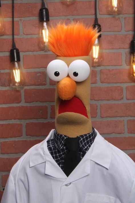 This meticulously crafted replica of the beloved Muppets character Beaker puppet is a must-have for any fan of The Muppet Show. Designed with attention to detail, this puppet captures the essence of Beaker's endearing and comical personality. With bulging eyes, wavy orange hair, and his signature drawbridge mouth, this replica stays true to the original character created by Jim Henson. High-quality craftsmanship for an authentic look and feel Perfect for collectors, fans, or puppet enthusiasts D Muppet Characters, Orange Hair Characters, Orange Characters, Beaker Muppets, The Muppets, Jim Henson Creature Shop, Die Muppets, Bulging Eyes, Parody Songs