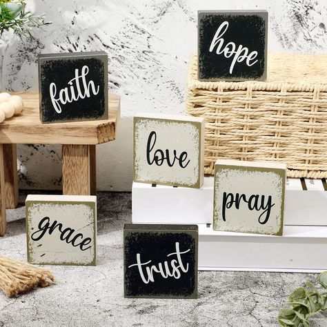 PRICES MAY VARY. Different Words: the package comes with 6 pieces of tabletop block signs, which are printed with [Love, Grace, Pray, Faith, Trust, Hope], can meet your decorate needs and replacement, ideal for your daily home decor Suitable Size: these inspirational blocks for shelves measure approx. 2.5 x 2.5 x 0.6 inches, thickness is 0.6 inch/1.5 cm, suitable for decorating your home on tiered trays and table tops, adding a sense of life Quality and Reliable Material: these inspirational rus Wooden Table Decorations, Signs For Office, Tabletop Bookshelf, Farmhouse Tabletop, Farmhouse Tiered Tray Decor, Hanging Candle Lanterns, Block Signs, Farmhouse Tiered Tray, Christmas Tabletop Decor