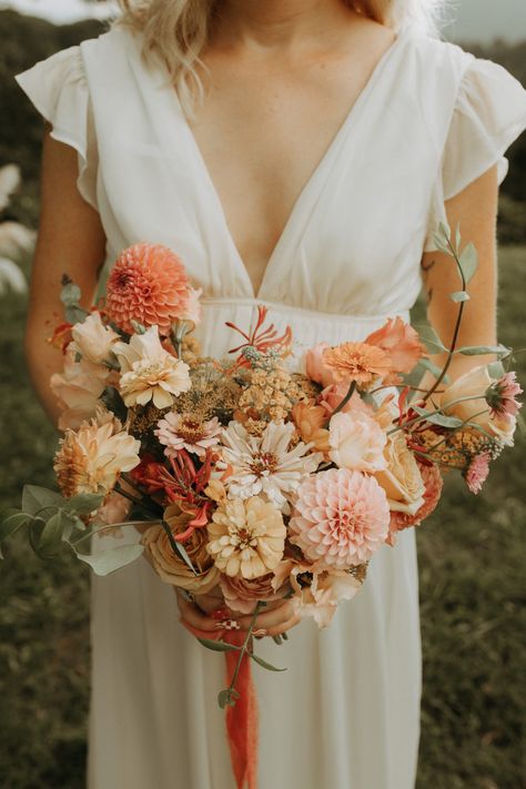 Shades of pink, peach and gold make this bridal bouquet a pastel dream Summer Pastel Wedding, Rainbow Roots, Pastel Wedding Bouquet, Peach Dahlia, Peach And Gold, Dahlia Bouquet, Flower Bar, Pastel Wedding, Pink Peach