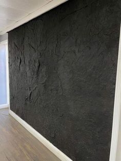 Rustic Wall Finishes Texture, Textured Walls Black, Rock Wall Shower Ideas, Black Stucco Wall, Modern Industrial Accent Wall, Stair Well Accent Wall, Texture Bathroom Walls, Textured Walls In Bathroom, Faux Rock Wall Interior Stone Panels