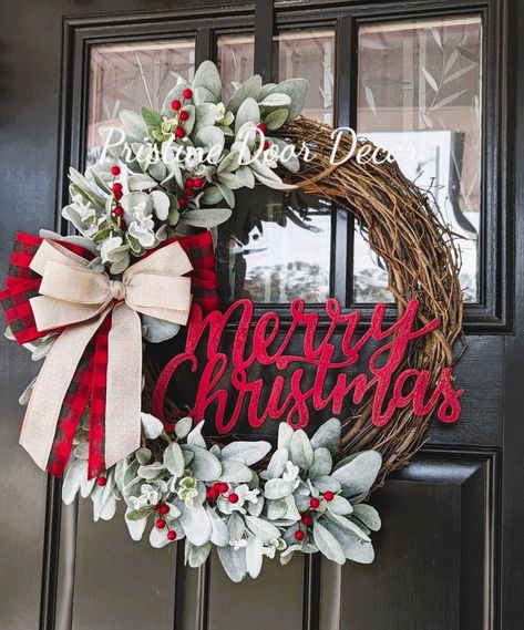 This farmhouse Christmas wreath is elegant and measures approximately 23 " from tip to tip. Christmas Wreath is made using a premium farmhouse buffalo plaid ribbon, perfectly placed lambs' ears, snowy Eucalyptus sparkly picks, red berries an adorable Merry Christmas sign.  This Wreath is the perfect touch of Rustic Farmhouse and Christmas together. I do recommend placing under a covered porch, behind glass door or inside.  If you would like a different color Christmas bow, please reach out to me.  Wreaths ships in a sturdy box that is great for storing in when not in use.      Please check out my other handmade wreaths at  https://www.etsy.com/shop/Pristinedoordecor Please message with any questions. Wreaths / Farmhouse Christmas Wreaths / Holiday Wreaths / Farmhouse Christmas Wreath / Wre Traditional Christmas Wreaths Diy, Western Christmas Wreaths, Wreath With Poinsettias, Christmas Grapevine Wreaths Diy, Christmas Wreaths For Front Door Vintage, Farmhouse Wreath Ideas, Outdoor Christmas Wreaths On House, Diy Evergreen Wreath, Square Christmas Wreaths