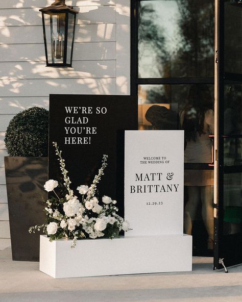 Coordinating welcome sign + seating chart… yes, please! ✨Cheers to Brittany and Matt ✨ last pic because the lighting was just too good!!!… | Instagram Welcoming Board, Boxwood Manor, Welcome Sign Seating Chart, Sign Seating Chart, Wedding Entrance Sign, Black And White Wedding Theme, White Wedding Theme, Dream Wedding Decorations, Wedding Entrance