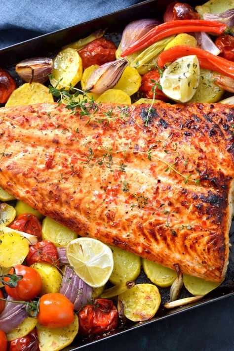 Jamie Oliver Salmon Tray Bake 30 Minute Meals Jamie Oliver Salmon Recipes, Salmon Tray Bake Recipes, Jamie Oliver Fish Recipes, Baked Trout Fillet, Jamie Oliver Salmon, Jamie Oliver 30 Minute Meals, Salmon Tray Bake, Baked Trout, Salmon Fillet Recipes