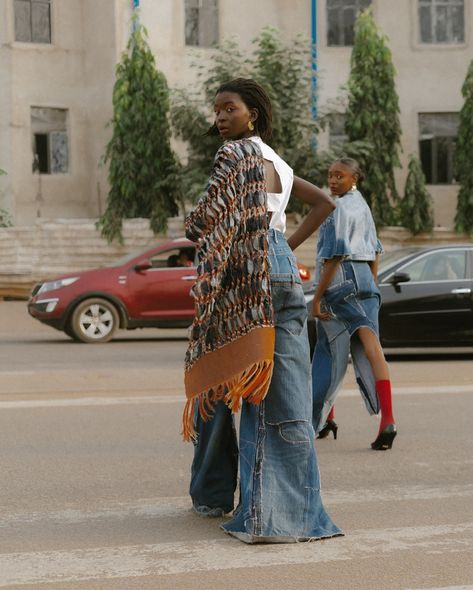 “Taking It To The Streets” with a selection of their best-selling pieces for their latest campaign, Nkwo Official ( @nkwo_official ) epitomizes their dedication to sustainable fashion and the celebration of African craftsmanship. Each garment intricately blends traditional textiles with contemporary aesthetics, meticulously handcrafted in Nigeria using locally sourced materials. With bold prints, exquisite detailing, and visionary silhouettes, their collections embody a profound commitment t... Shattered Reflection, Armor Skirt, Sustainable Fashion Upcycling, Nigeria Fashion, Unique Fashion Outfits, Denim Aesthetic, Bling Denim, Traditional Textiles, Quilted Denim