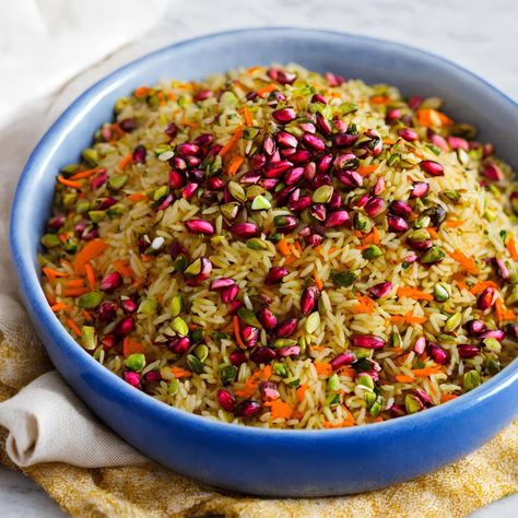 This jeweled rice recipe is a show-stopping dish. The combination of colours and textures paired with the fragrant aroma and complex flavours make this recipe a truly worthy dish for any special occasion. This Middle Eastern inspired rice dish is called jeweled rice due to the that resembles gems. A celebratory dish that is often […] The post Jeweled Rice appeared first on Scrumptiously. Jeweled Persian Rice Pilaf, Rice With Gravy, Jewelled Rice, Persian Jeweled Rice, Jeweled Rice, Persian Rice, Rice Salad Recipes, Eid Food, Birthday Vibes