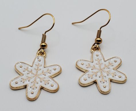 Add a touch of festive charm to your holiday look with these Christmas White Snowflake fishhook earrings! ❄️✨ Perfect for Christmas occasions, these handmade dangle/drop earrings will make you shine! #ChristmasEarrings #SnowflakeJewelry #HandmadeGems #FestiveFashion #HolidayStyle  #Christmas #Earrings #Snowflake Snowflake Jewelry, Fishhook Earrings, Christmas White, Fish Hook Earrings, White Snowflake, Christmas Earrings, Holiday Looks, Fish Hook, Holiday Fashion