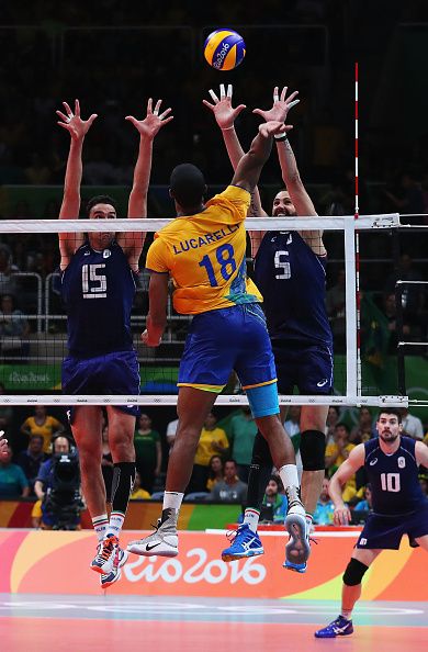 Ricardo Lucarelli of Brazil spikes the ball during the Men's Gold Medal Match… Men Volleyball Aesthetic, Yellow Volleyball Aesthetic, Brazil Volleyball Team, Hawaii Mens Volleyball, Spiking In Volleyball, Volleyball Wallpaper, Brazilian Men, Volleyball Photography, Mens Volleyball