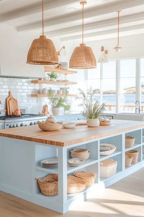 Discover the latest kitchen design with a serene coastal vibe! This bright and airy space features wicker accents, open shelving, and ocean views. Perfect for a refreshing and functional kitchen. #CoastalKitchen #InteriorDesign #LatestKitchenDesign Coastal Cowgirl Kitchen, Coastal Mediterranean Kitchen, Beach House Kitchen Design, Small Beach House Kitchen, Colorful Coastal Decor, Coastal Chic Kitchen, Small Apartment Living Room Decor, Mint Green Room, Green Room Design