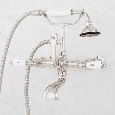 With porcelain lever handles and a beautifully sculpted design, this wall-mounted English-style tub faucet is sure to be the finishing touch in your bathroom suite. Finish: Polished Nickel Signature Hardware Telephone Style Wall Mounted Tub Faucet with Porcelain Lever Handles - Tub Only Faucets in Gray | Size 11.0 H x 7.0 W in | Perigold Clawfoot Tub Shower, Shower Vintage, Wall Mount Tub Faucet, Copper Faucet, Metal Tub, Style Anglais, Shower Diverter, Acrylic Tub, Chrome Faucet