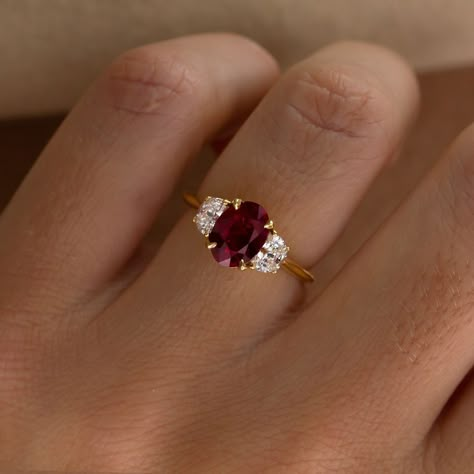 Falling in Love with rubies? This ring is available online ♥️♥️ Moonlight Setting 1.42ct Ruby Oval cut 18k Recycled Gold £5,760 with VAT Available Online #rubyring #engagementring #redruby #rubyengagementring #uniquering #engaged 3 Stone Ruby And Diamond Ring, Single Ruby Ring, Vintage Engagement Rings Ruby, Engagement Rings Moon, Diamond And Ruby Engagement Rings, Art Deco Engagement Ring Ruby, Engagement Rings Ruby, Ruby Engagement Rings, Ruby Ring Designs