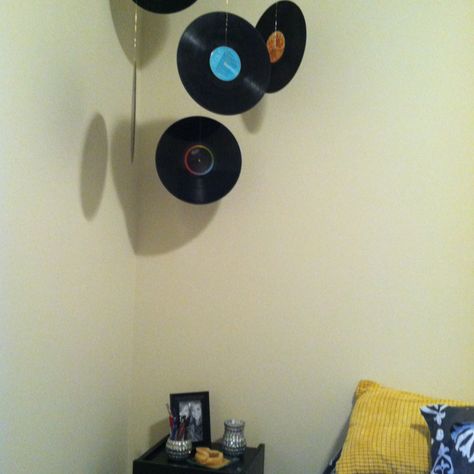 Hang old records from your ceiling with invisible string. Hanging Records From Ceiling, Fake Records On Wall, Records Hanging From Ceiling, Hanging Records, Record And Vines Room Decor, Melted Vinyl Records, Vinyl Record Wind Chime, Hangout Room, Old Records