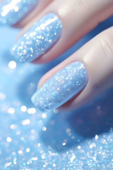 pastel blue nails, sky blue nail art, glittery nails, nail design ideas, nail trends, trendy nail colors, nail inspiration, nail art, nail style, nail fashion, nail aesthetics, nail beauty, nail creativity, nail shades, nail looks, nail tips, nail hacks, nail goals, nail vibes, nail obsession, nail chic, nail magic, nail dreams, nail goals, nail love, new year nails Sky Blue Nail Art, Nails Sky Blue, Trendy Nail Colors, Pastel Blue Nails, Nail Vibes, Blue Nail, Blue Glitter, Blue Nails, Nail Design